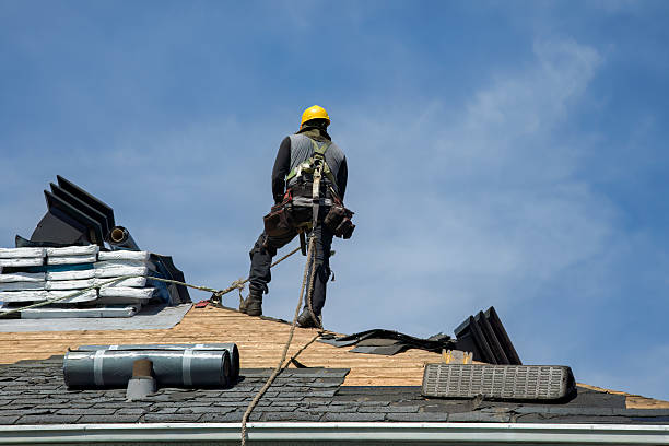 Professional Roof Replacement technician working in Rosedale, NY